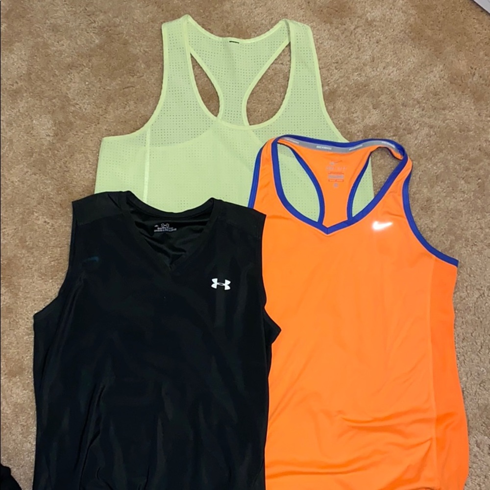 Bundle of tank tops and sleeveless workout shirts